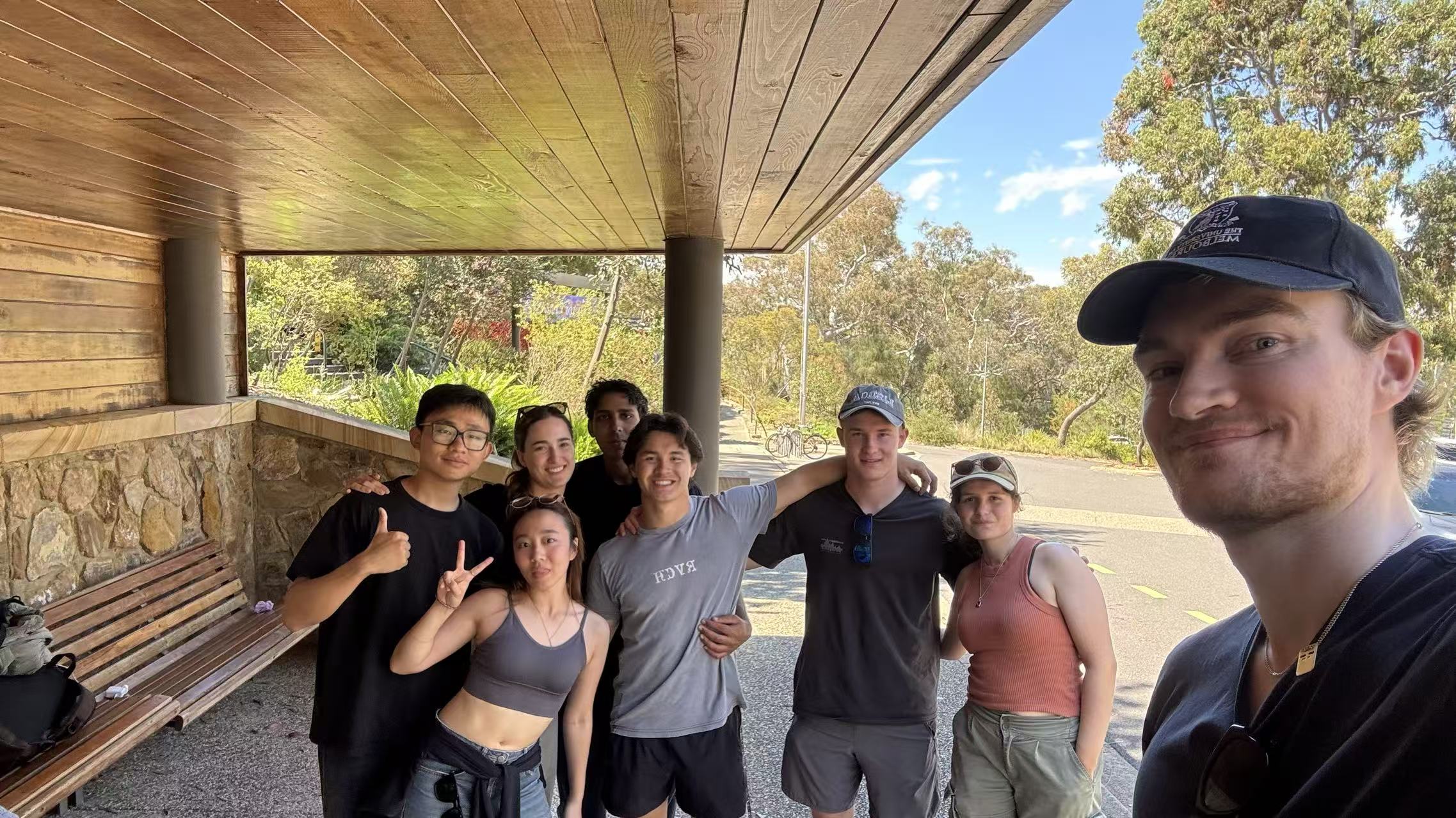 Founder with international friends during travels, representing the global bridge vision behind OpenBridge.